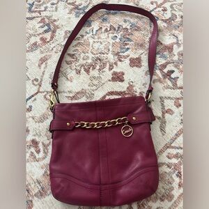 Coach Leather Shoulder Bag with Chain Accent.